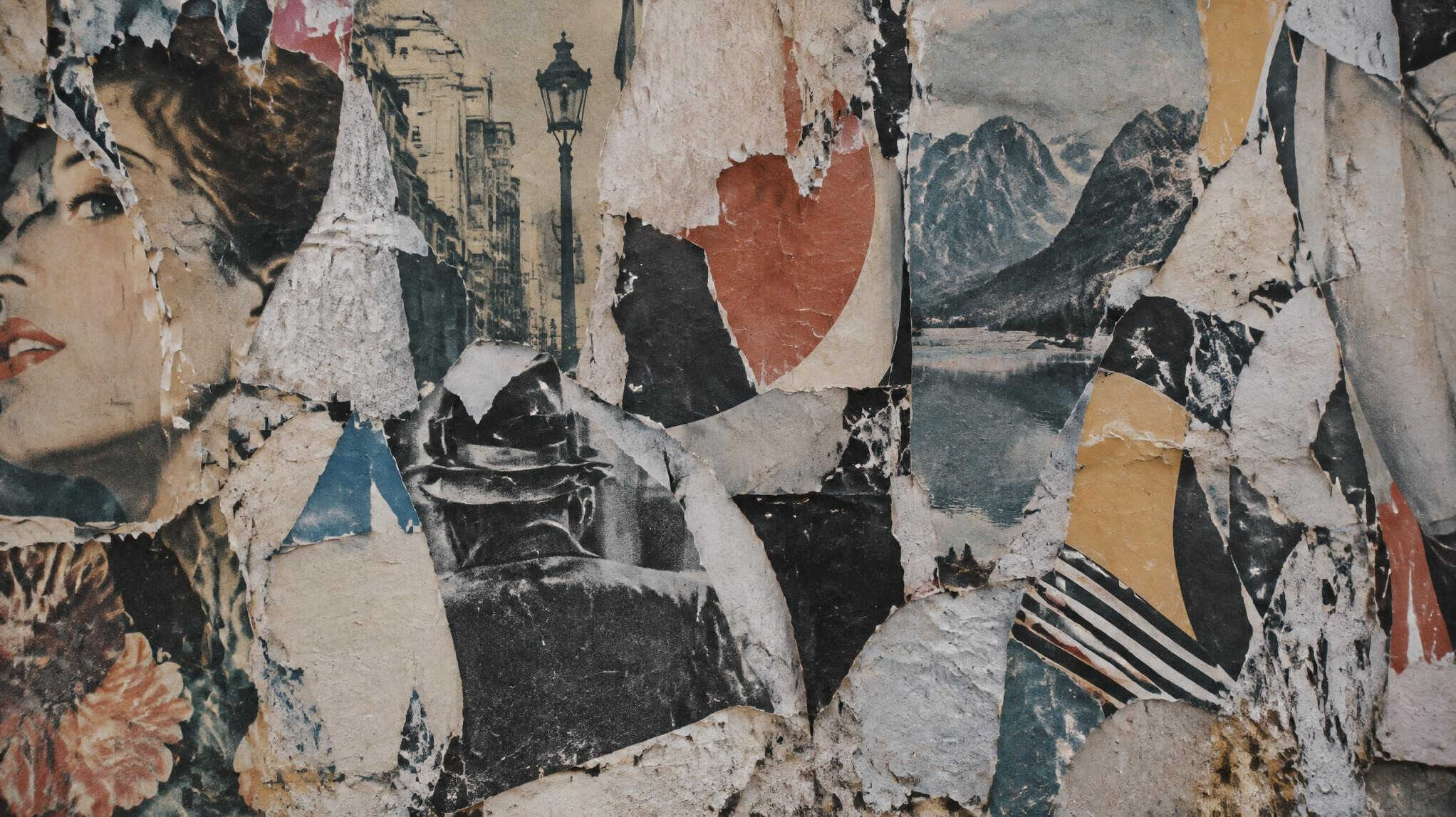 Wall covered with layered vintage printed posters